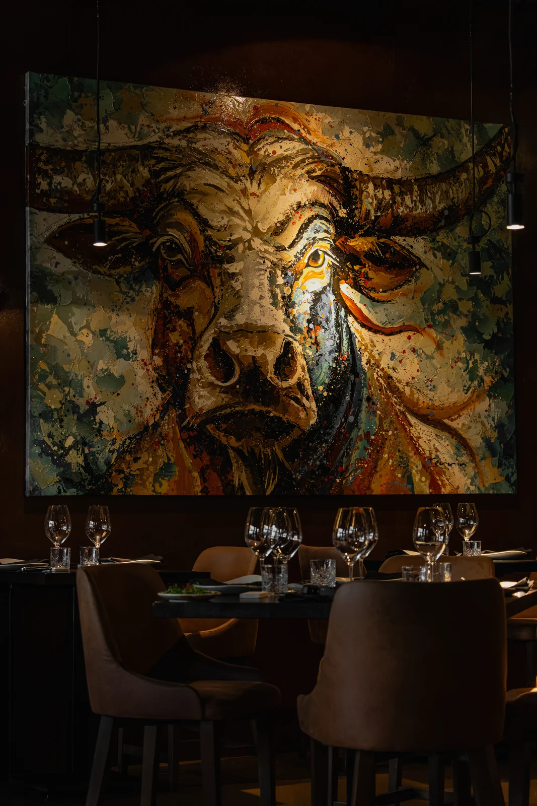 Bull artwork in the Origen dining room
