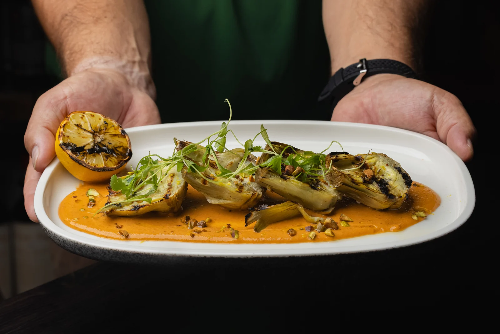 Charcoal-grilled artichokes with romesco cream